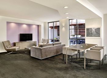 Game room with foosball and pool tables